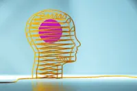 Digital generated image of yellow cable forming a human's head.