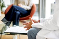 Therapist and client in therapy.